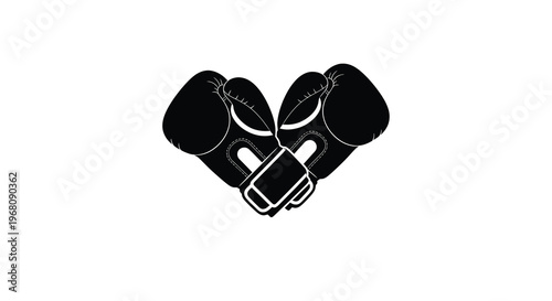 A pair of black boxing gloves are arranged to form the shape of a heart against white
