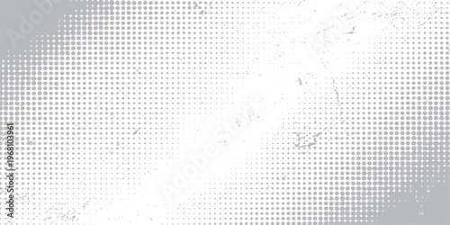 Seamless abstract grunge background with gray textured dots and a square grid pattern for digital wallpaper design
