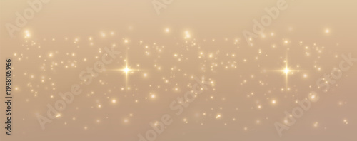 Luxurious gold background with soft glow and sparkling glitter creates an elegant beige gradient texture perfect for premium cosmetic or champagne product displays.