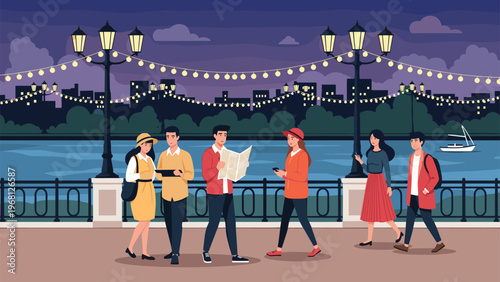 Diverse group of people strolling along city riverfront promenade at night under festive string lights and bright street lamps.