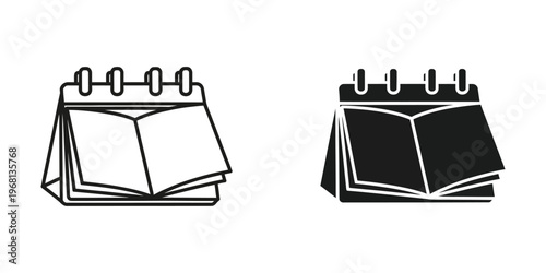 Open notebooks with different page fill statuses displayed side by side