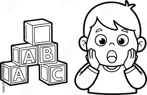 Surprised young boy with blocks.