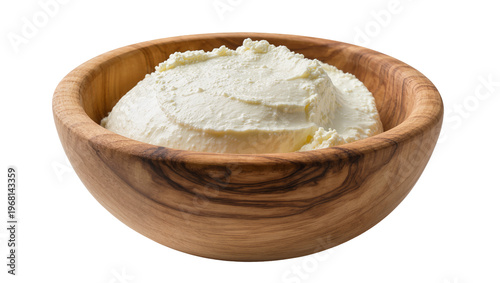 Fotografía Creamy white ricotta cheese filling a rustic wooden bowl, isolated on transparen