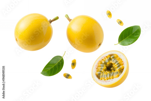Yellow passion fruits with leaves and seeds on white background