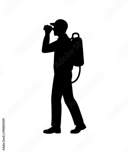 Exterminator worker walking carrying a pest control sprayer