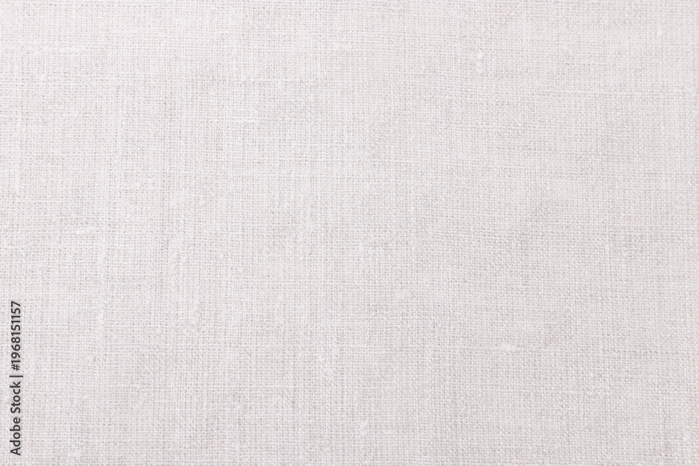 Fototapeta premium Textured linen background, natural coarse woven fabric surface, soft neutral Cloud Dancer tone, organic textile texture, light rustic backdrop, copy space for branding, wedding, packaging, stationery