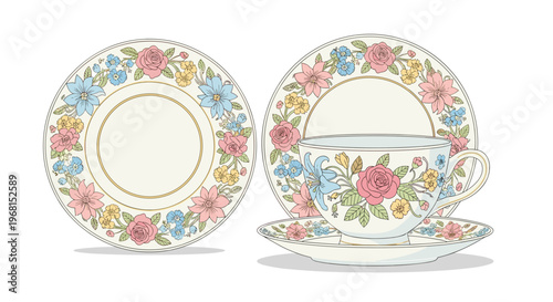 Elegant porcelain teacup set with floral patterns in pastel colors, featuring a teacup, saucer, and plate against a white background