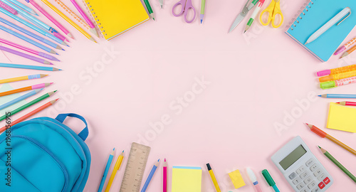 Back to School Flat Lay with Colorful Supplies on Pastel Background
