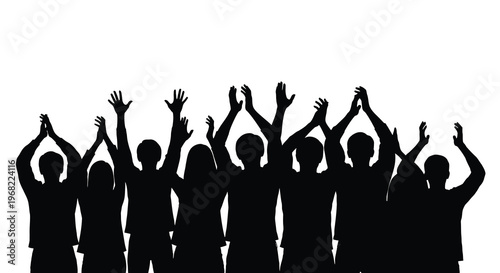 A group of people raising their hands in celebration silhouette