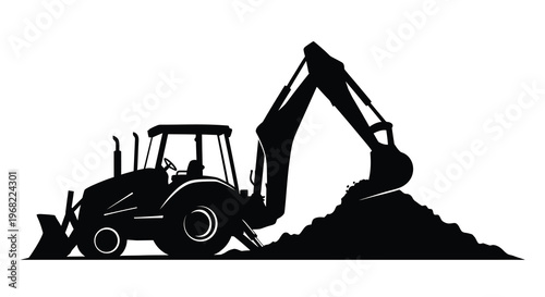 Heavy machinery excavating earth a striking black silhouette