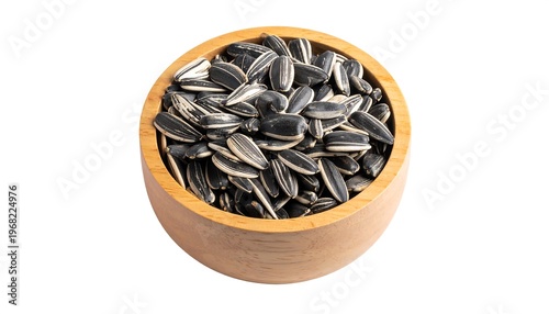 Close-up shot of a wooden bowl filled to the brim with hulled sunflower seeds against a clean white backdrop