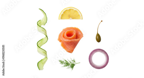 Smoked salmon rose with cucumber spiral, lemon slice, caper, dill, and red onion ring isolated on transparent background