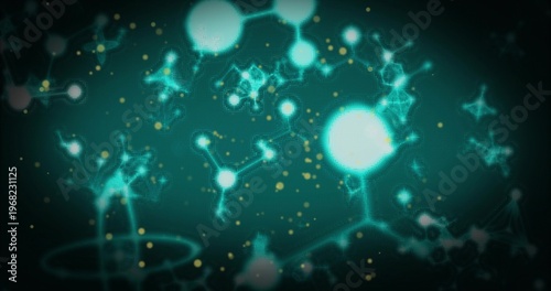 Glowing turquoise nodes circling bright sphere at center in teal visual with filaments, gold dust