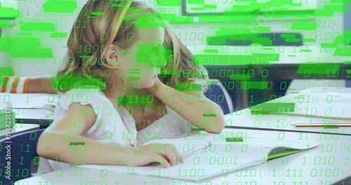 Leaning front student in short-sleeve top, gazing right in classroom with notebook, binary overlay