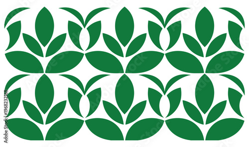 Green leaf pattern arranged in a symmetrical and repetitive design layout