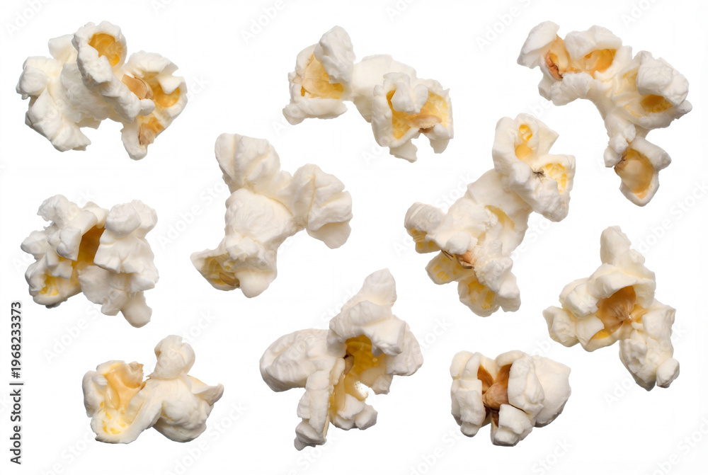 Fototapeta premium Popcorn pieces scattered isolated on white background snack food texture pattern