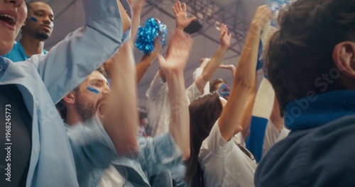 Close-up of Joyful Football Supporters in a Packed stadium as Diverse Group of Fans Celebrate Team Victory at Professional International League Match, Cheering From the Arena Stands