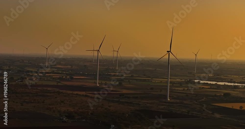 Wallpaper Mural Aerial view of Windmills/ Wind Turbines Operating in Rajkot, Gujarat, India. Renewable energy, Wind Energy Production, Wind Farm in India, Developing India Concept  Torontodigital.ca