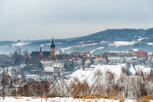 The church in the center of Jordanow in a winter setting