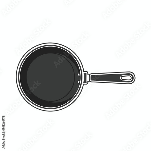 Overhead view of a dark gray frying pan with a black handle and a hanging hole