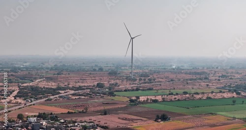 Wallpaper Mural Aerial view of Windmills/ Wind Turbines Operating in Rajkot, Gujarat, India. Renewable energy, Wind Energy Production, Wind Farm in India, Developing India Concept  Torontodigital.ca