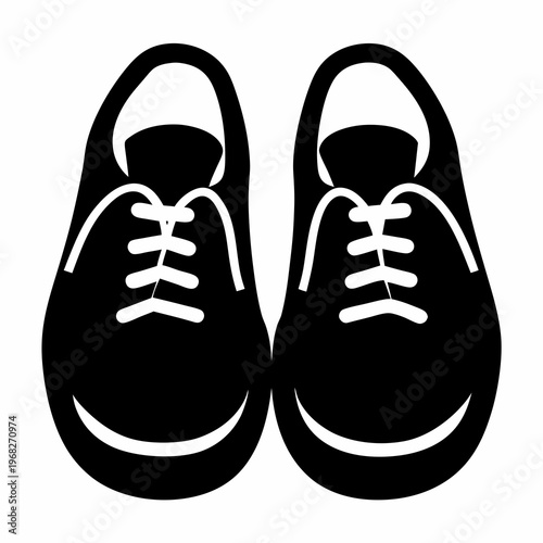 A pair of black and white simple design casual shoes isolated