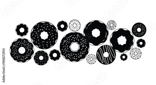 A collection of decorative donuts presented in a striking silhouette