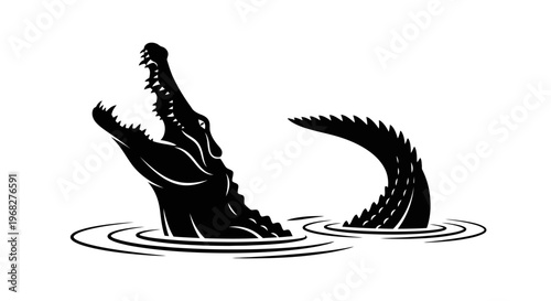 Alligator emerges from water with open jaws.