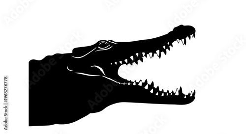 Alligator head silhouette with open mouth and sharp teeth.