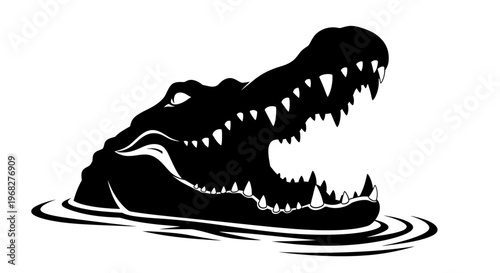 Alligator head with open mouth in water.