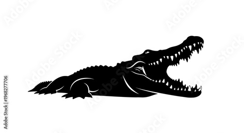Alligator or crocodile with open mouth showing sharp teeth.