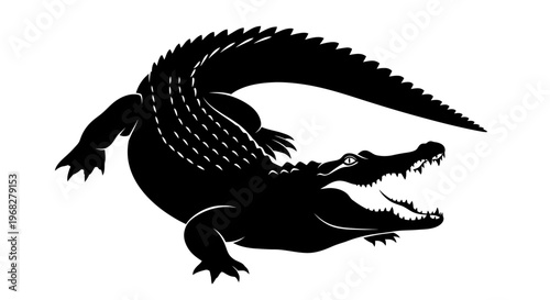 Powerful black silhouette of a crocodile with open jaws.