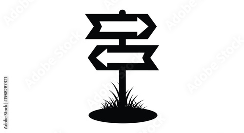 Black and white directional signpost with two arrows pointing in opposite directions outside