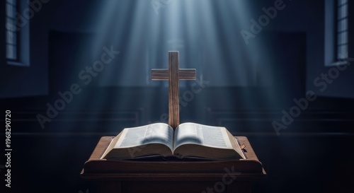 Sunlight beams through a church sanctuary illuminating an open bible and wooden cross