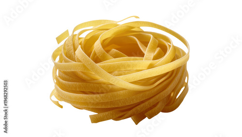 Slika na platnu Pile of uncooked golden fettuccine pasta, elegantly arranged and isolated on tra