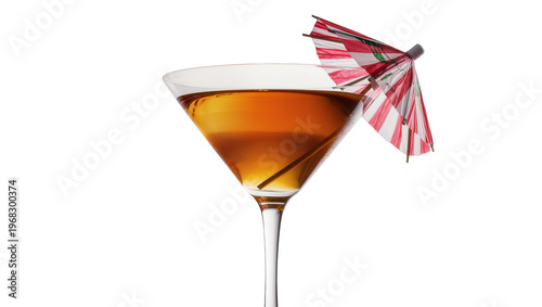 Amber colored alcoholic cocktail in a stemmed martini glass garnished with a red and ivory striped paper parasol, isolated on transparent background for beverage promotions