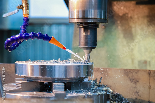 Quadro su tela Drilling machine makes a hole in the metal product.
