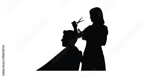 Hairdresser cutting a client s hair in a dramatic silhouette