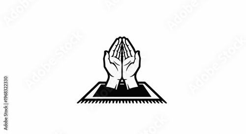 Praying hands on prayer mat