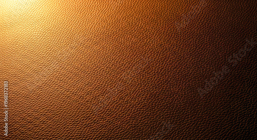 Golden brown leather texture background with sunlight