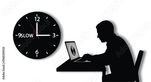 man working late at night on laptop computer