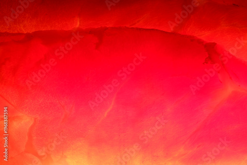 Vibrant hues dance in the sunset sky above the tranquil sea