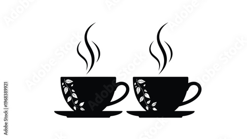 Two black coffee cups with floral designs a striking silhouette