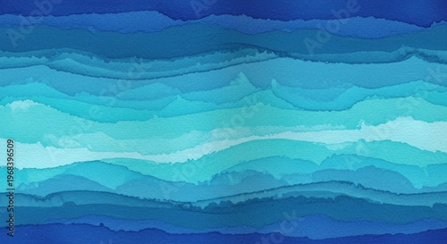 The serene ocean waves gently roll onto the shore under a clear blue sky with varying shades of blue hues.
