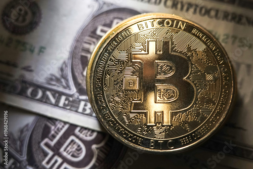 Gold Bitcoin BTC Coin on Banknote Background, Bitcoin BTC Investment Concept or Cryptocurrency Market.