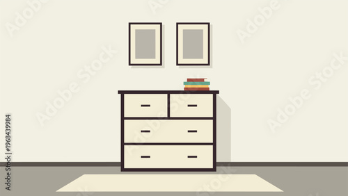 Simple interior scene with a white chest of drawers, a stack of books, and two empty frames hanging on the wall.