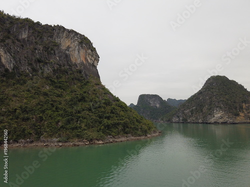 Vászonkép Karst islands and calm water in Ha Long Bay Vietnam