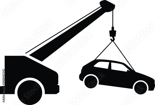 Silhouette of a tow truck lifting a car with black and white with vehicle maintenance