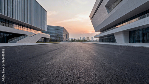 Modern Urban Architecture with Empty Road at Sunset
