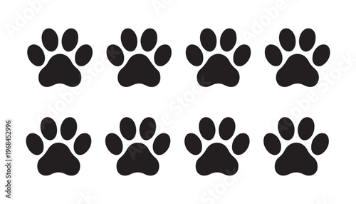Black animal paw prints on white background, vector set of pet foot trail, dog cat pawprint.